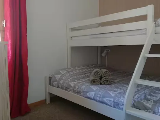 Double bed with single bunk above