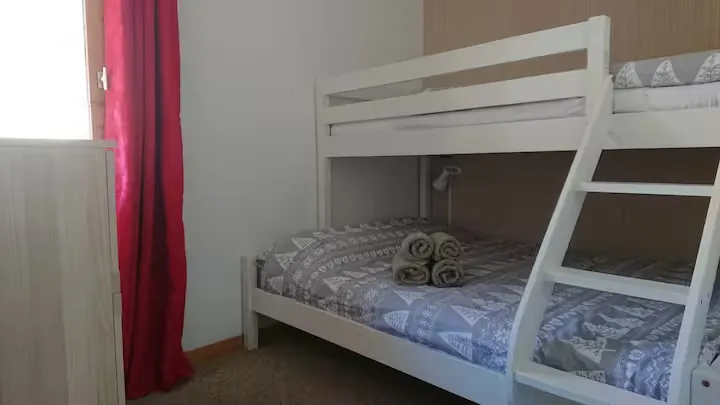 Double bed with single bunk above